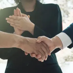  handshake in a professional office setting