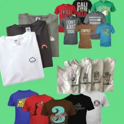 A variety of printed t-shirts featuring unique designs displayed together in a collection. 2. A collection of printed t-shirts showcasing diverse and creative designs arranged side by side. 3. An assortment of printed t-shirts with various artistic designs presented in a cohesive display.